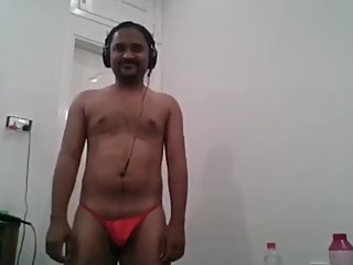 Indian guy weraing red ladies thong