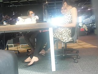 Indian Girl dangling under the table